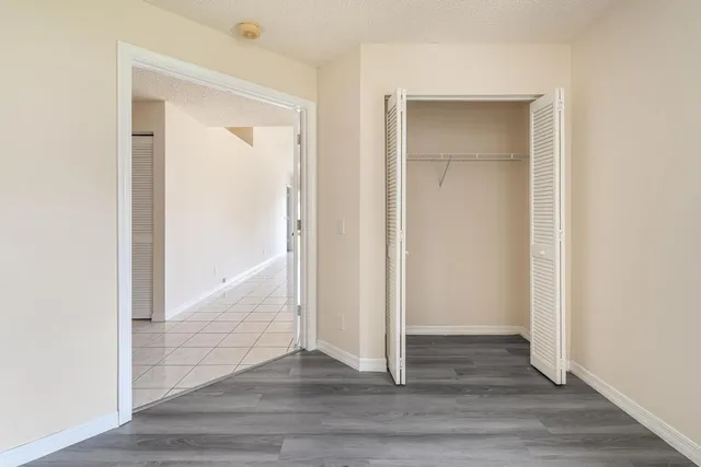 an empty room and wooden floor