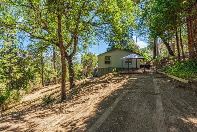a view of a red and white house