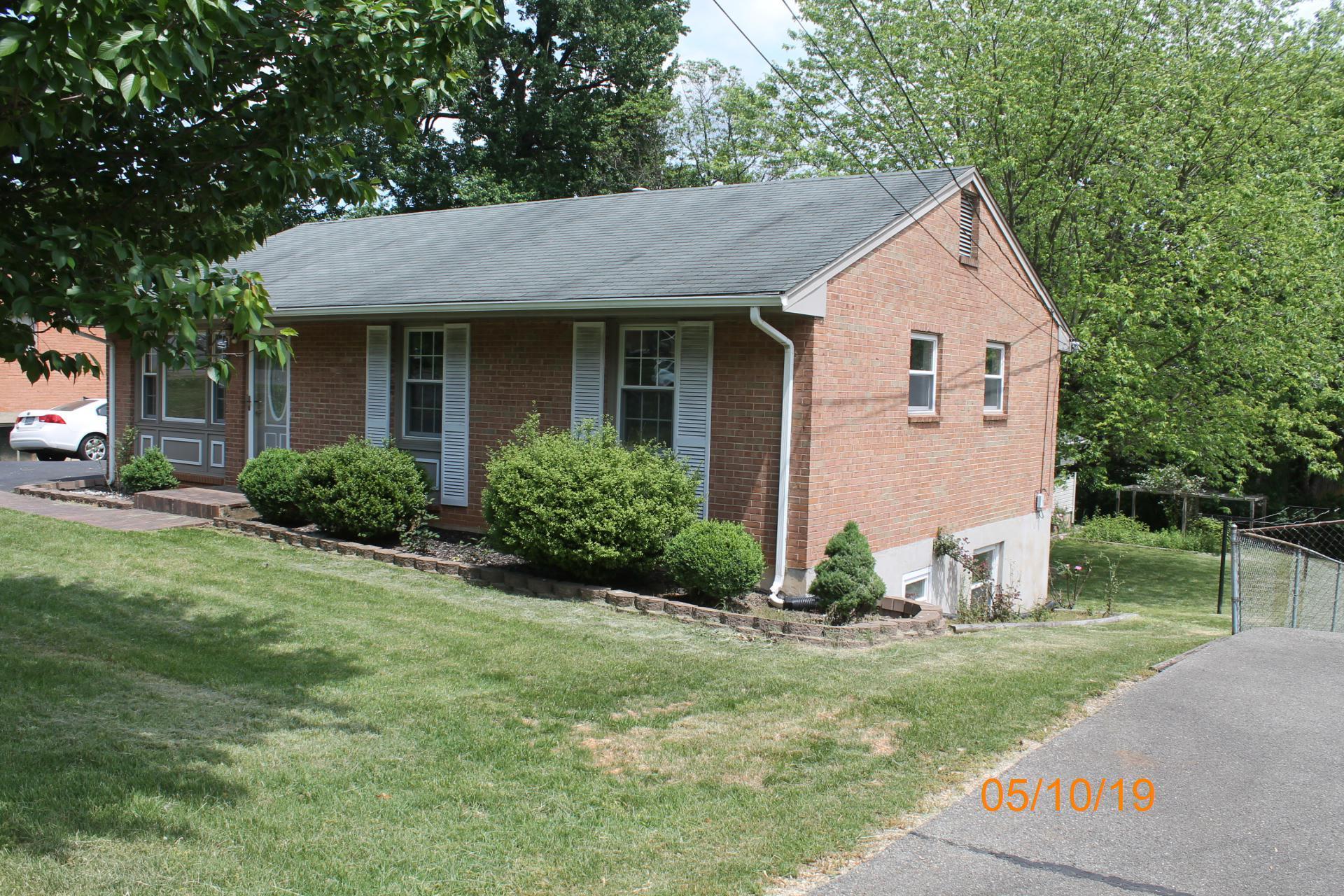 745 Kenyon Road Vinton, VA 24179 - Photo 2 of 52 a view of a white house with a yard and plants