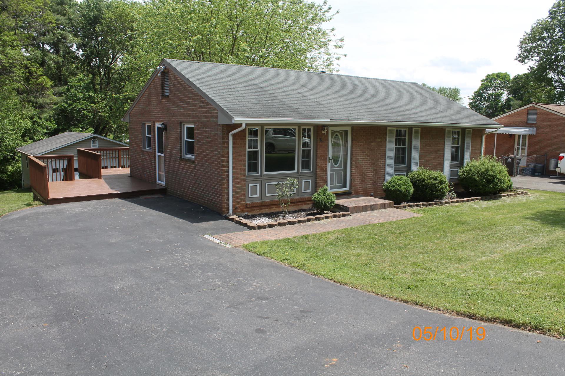 745 Kenyon Road Vinton, VA 24179 - Photo 12 of 52 a front view of a house with yard patio and green space