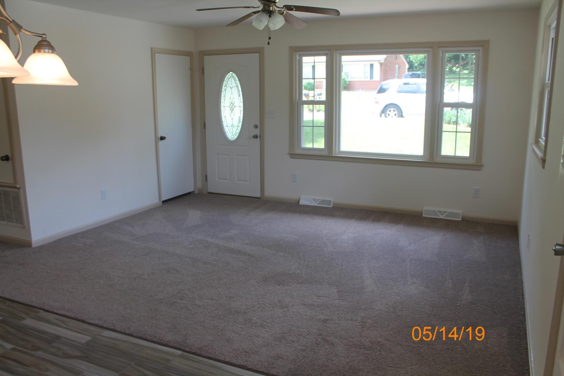 745 Kenyon Road Vinton, VA 24179 - Photo 18 of 52 an empty room with windows and fan