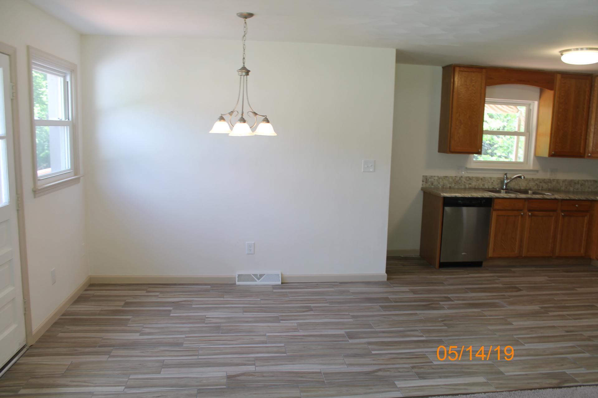 745 Kenyon Road Vinton, VA 24179 - Photo 21 of 52 a view of a kitchen from the hallway