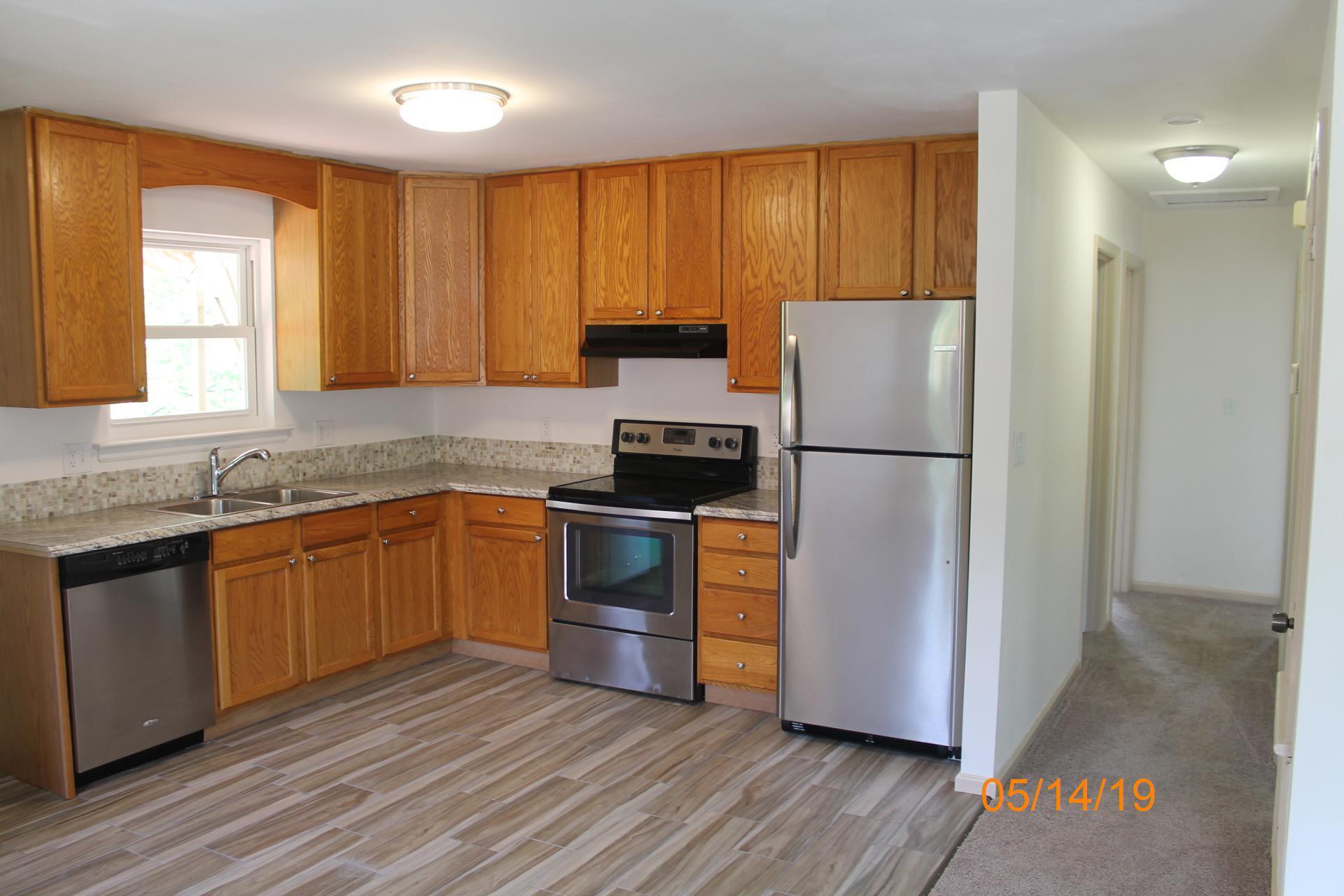 745 Kenyon Road Vinton, VA 24179 - Photo 24 of 52 a kitchen with a refrigerator sink and stove