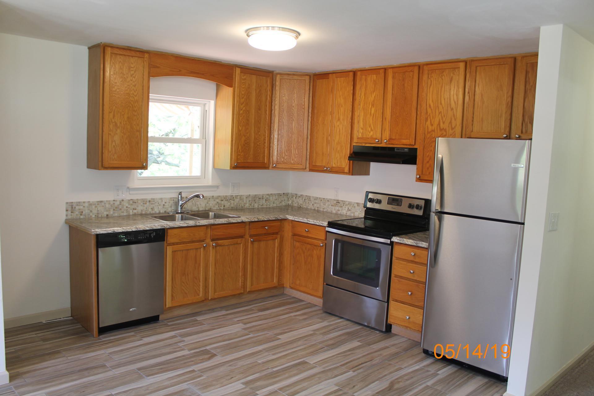 745 Kenyon Road Vinton, VA 24179 - Photo 25 of 52 a kitchen with a refrigerator sink and cabinets