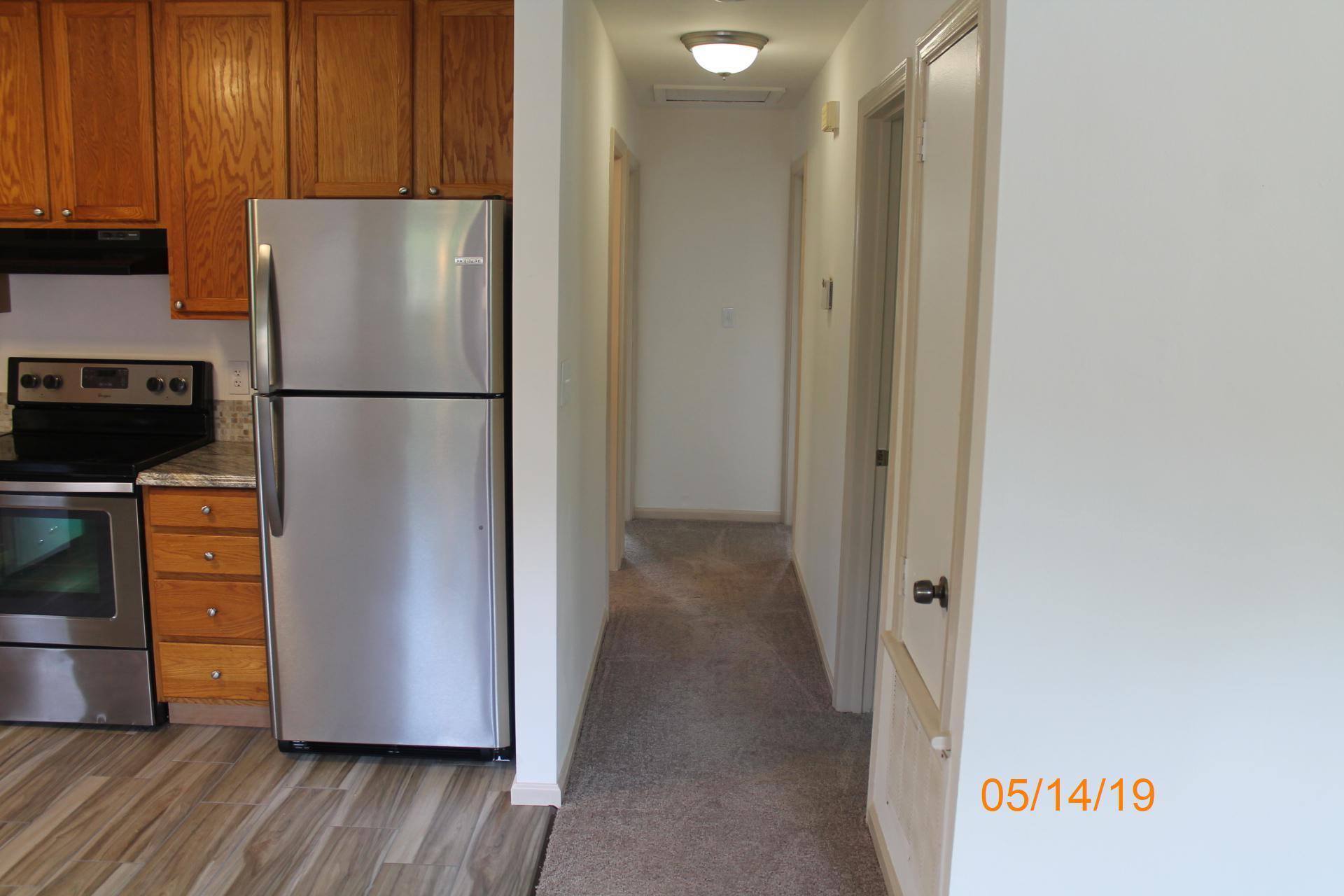 745 Kenyon Road Vinton, VA 24179 - Photo 31 of 52 a view of kitchen with refrigerator stove and cabinets