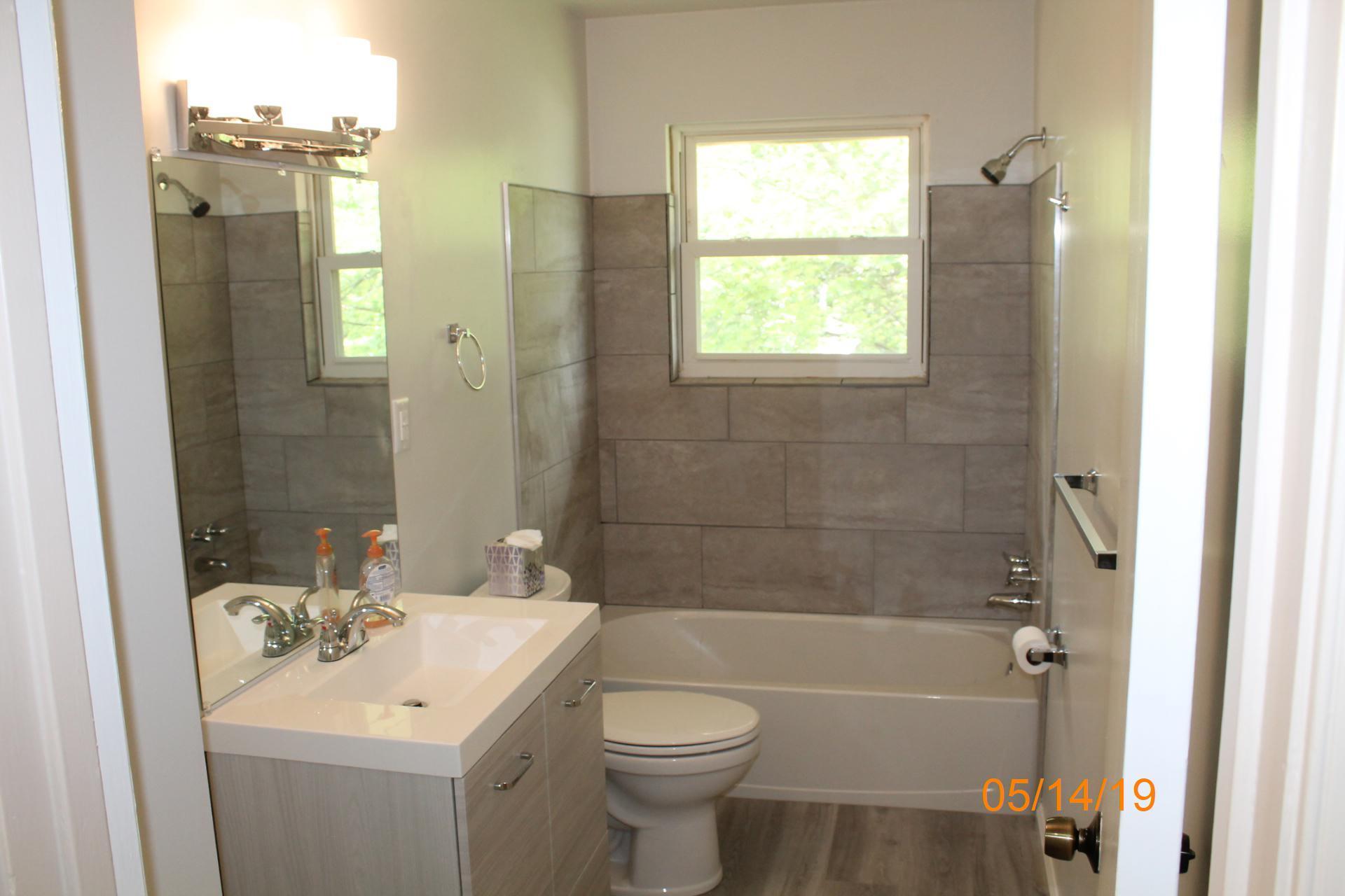 745 Kenyon Road Vinton, VA 24179 - Photo 39 of 52 a bathroom with a sink a toilet and shower
