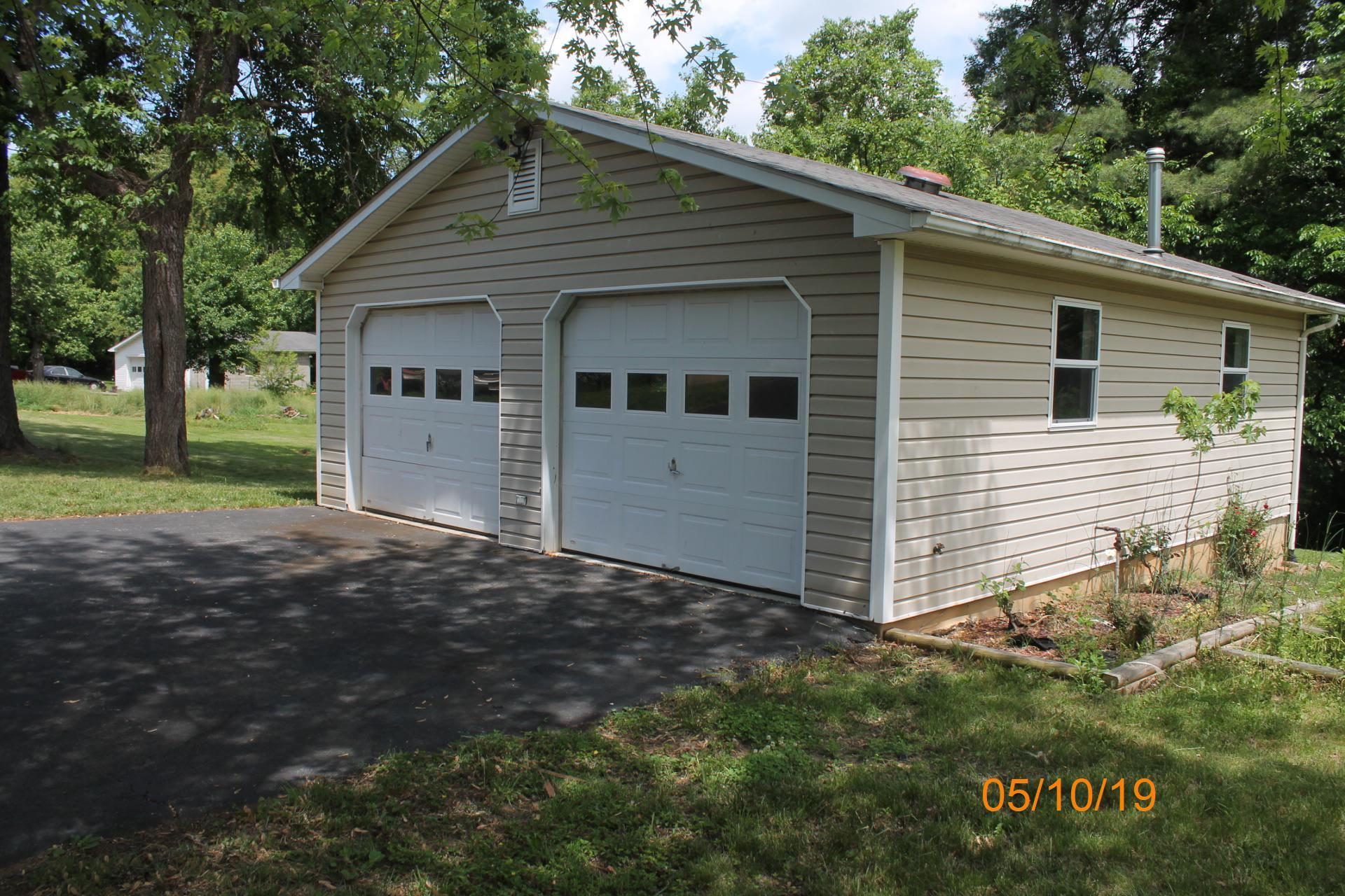 745 Kenyon Road Vinton, VA 24179 - Photo 48 of 52 a view of a house with a yard