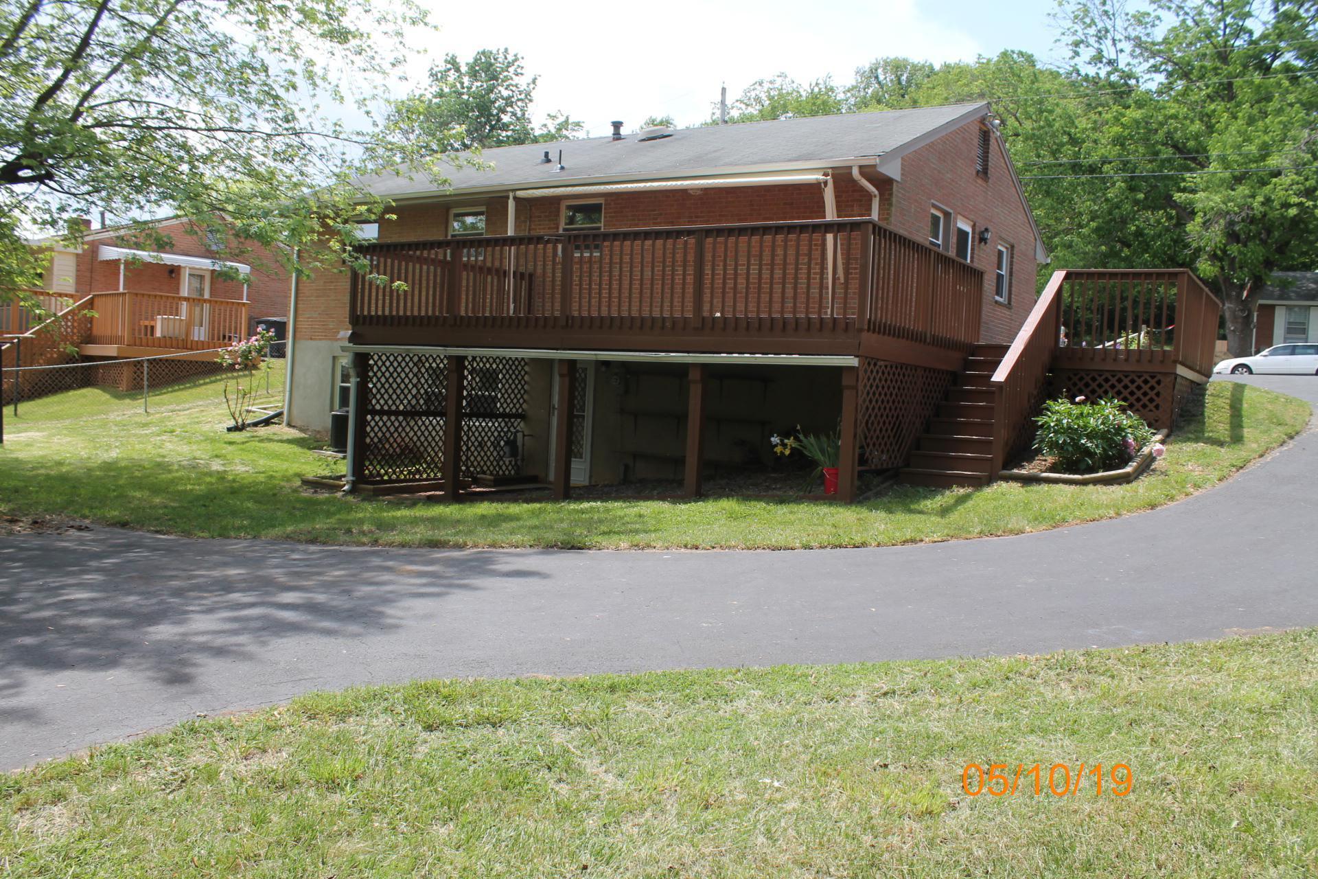 745 Kenyon Road Vinton, VA 24179 - Photo 8 of 52 a view of a house with a yard and plants
