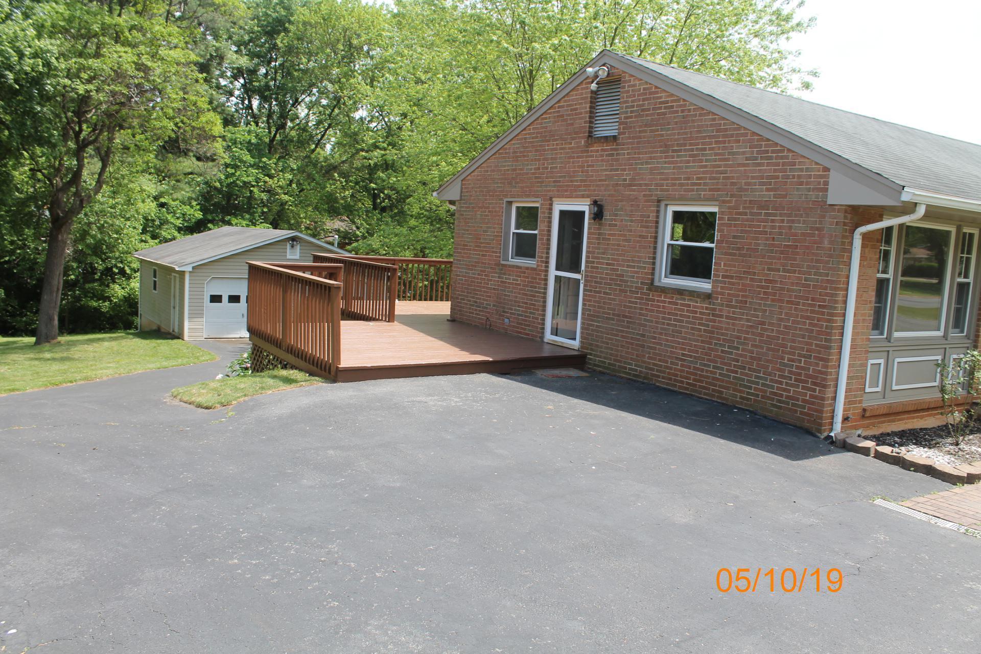 745 Kenyon Road Vinton, VA 24179 - Photo 10 of 52 a view of a house with a yard and garage