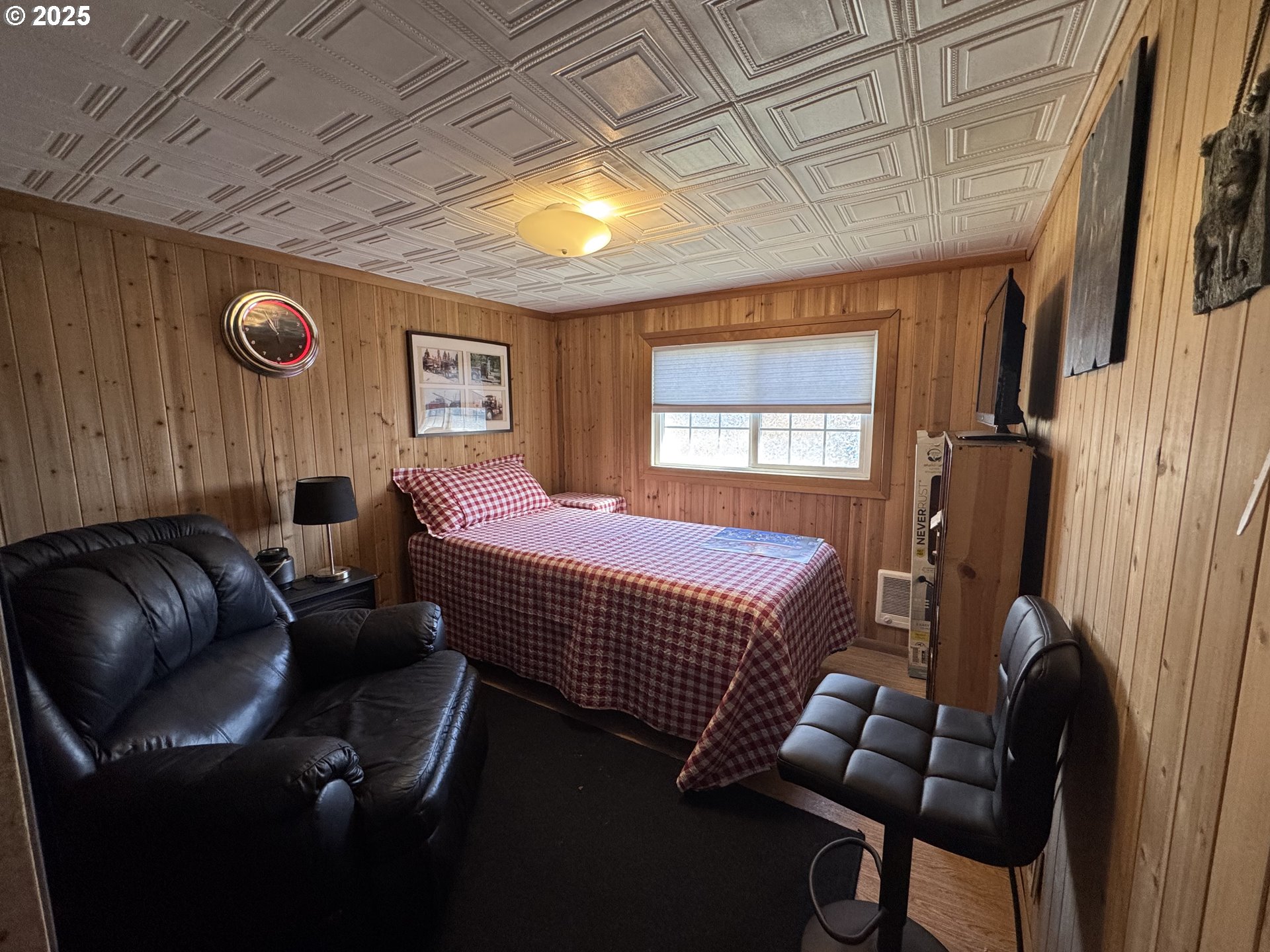 361 Bridge Street Echo, OR 97826 - Photo 11 of 13 a bedroom with furniture and a window
