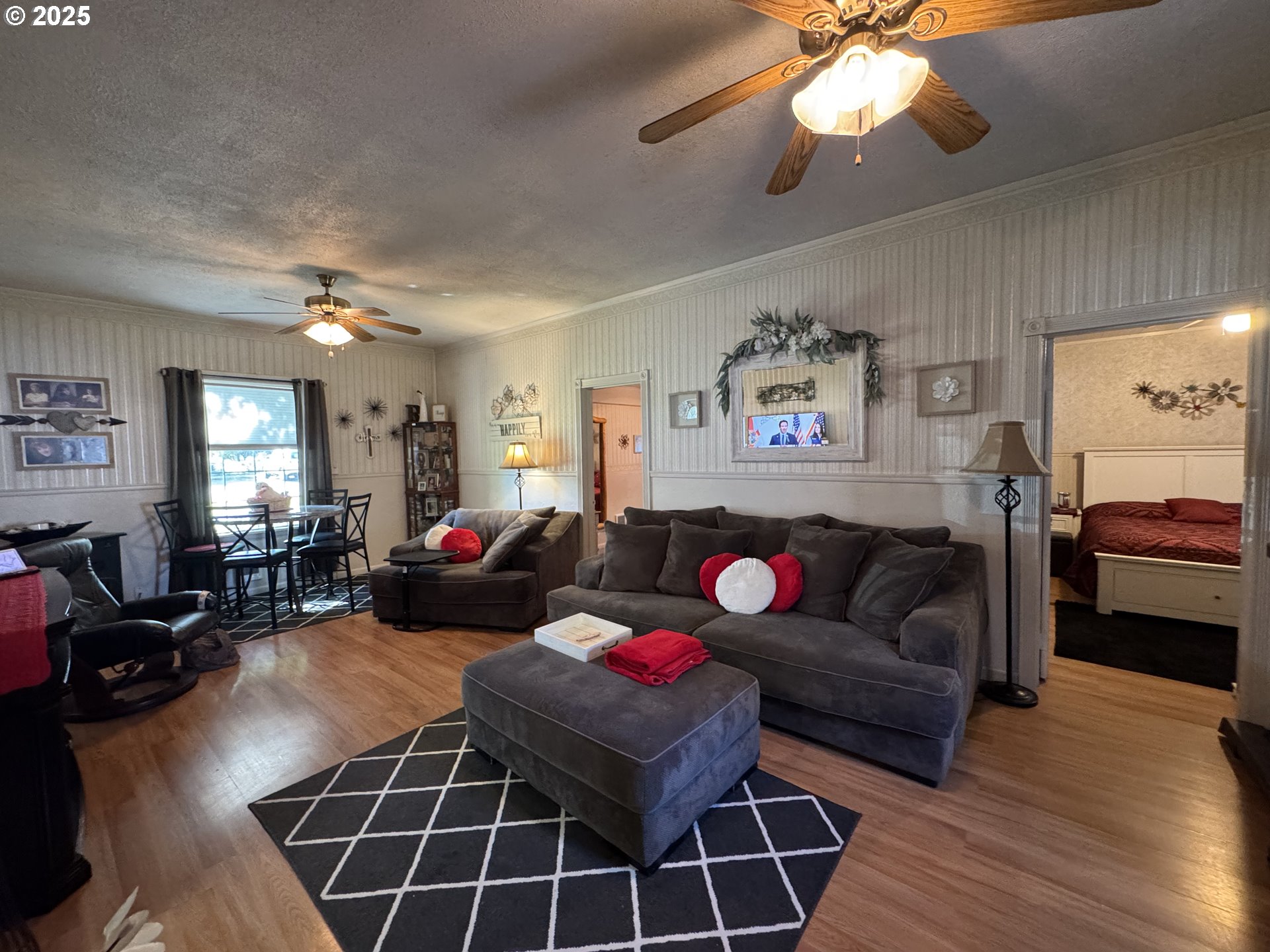 361 Bridge Street Echo, OR 97826 - Photo 6 of 13 a living room with furniture and wooden floor