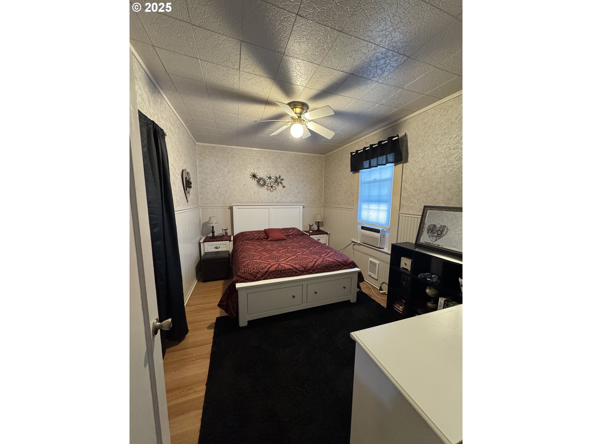 361 Bridge Street Echo, OR 97826 - Photo 7 of 13 a living room with furniture and a ceiling fan
