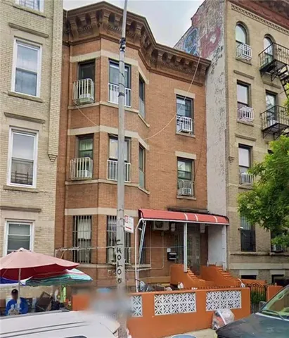 a front view of a building with street