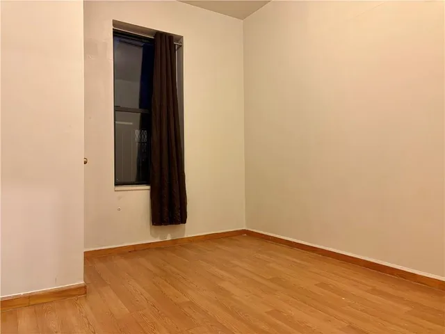 a view of a kitchen with washing machine and a sink