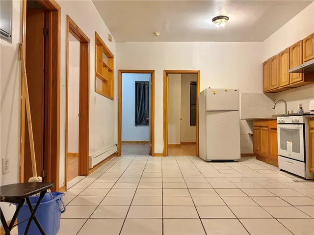a view of a storage & utility room with washer and dryer