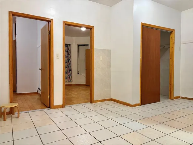 a view of a room & mirror