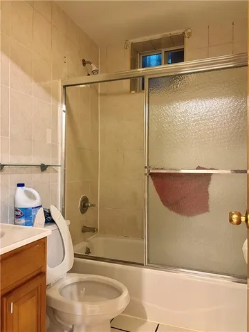 a view of a small space with wooden floor