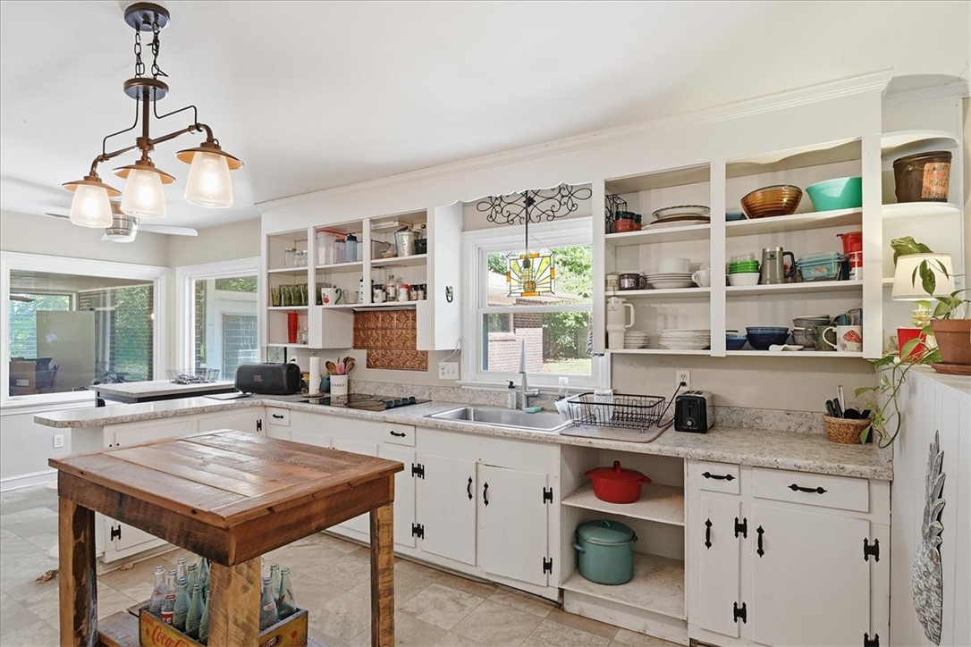 504 Jeb Stuart Avenue Anderson, SC 29621 - Photo 13 of 47 This spacious kitchen offers ample storage and a bright, welcoming atmosphere.