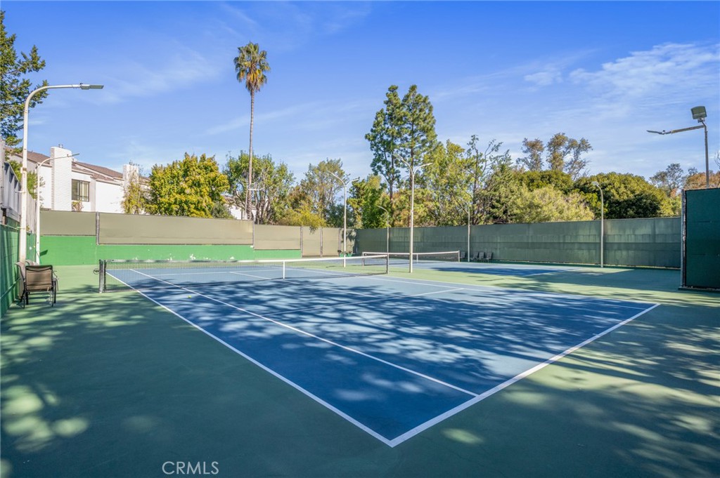 3604 West Estates Lane, Unit 117 Rolling Hills Estates, CA 90274 - Photo 28 of 36 a view of a tennis court