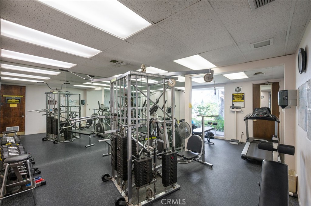 3604 West Estates Lane, Unit 117 Rolling Hills Estates, CA 90274 - Photo 29 of 36 a view of a room with gym equipment