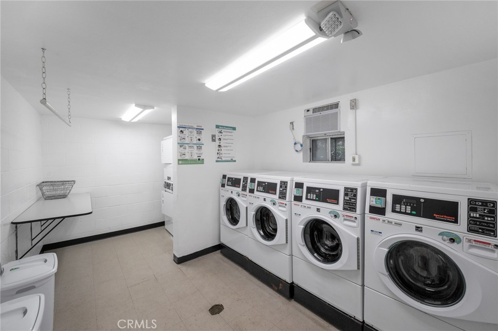 3604 West Estates Lane, Unit 117 Rolling Hills Estates, CA 90274 - Photo 30 of 36 a utility room with dryer and washer