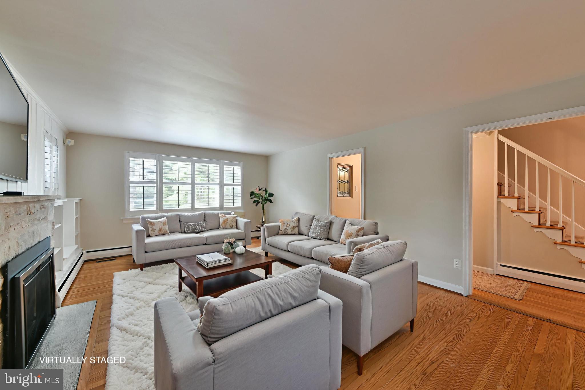 6113 West Mill Road Flourtown, PA 19031 - Photo 15 of 39 Sunlit Living Room Retreat VSTAGED