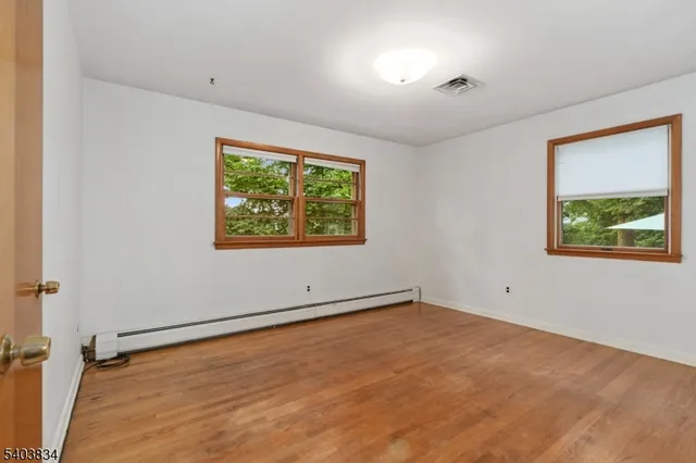 an empty room with windows