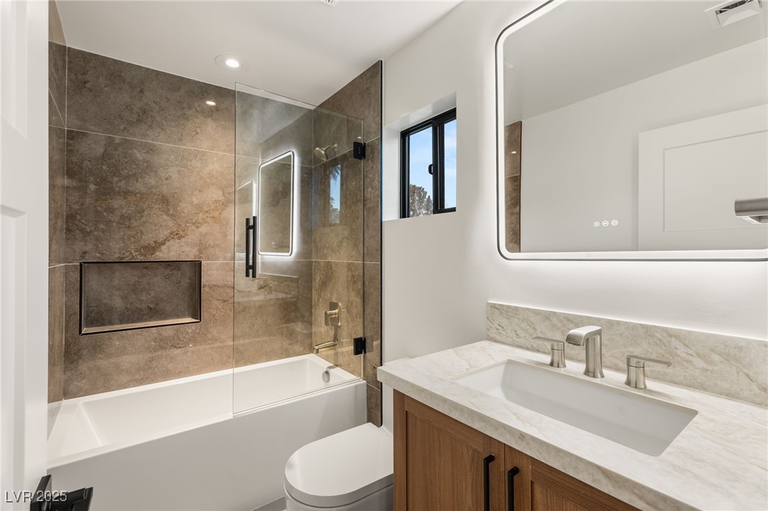 2316 Prometheus Court Henderson, NV 89074 - Photo 50 of 92 Full bath featuring vanity, shower / bathtub combination, visible vents, and toilet