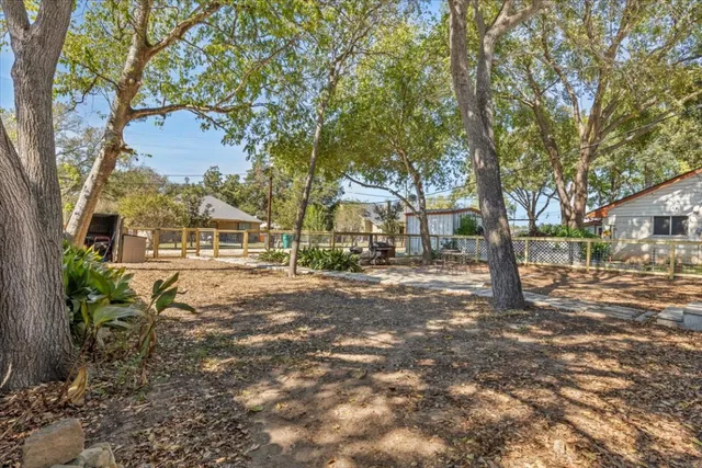 a view of road with trees