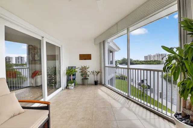 a view of a balcony with furniture