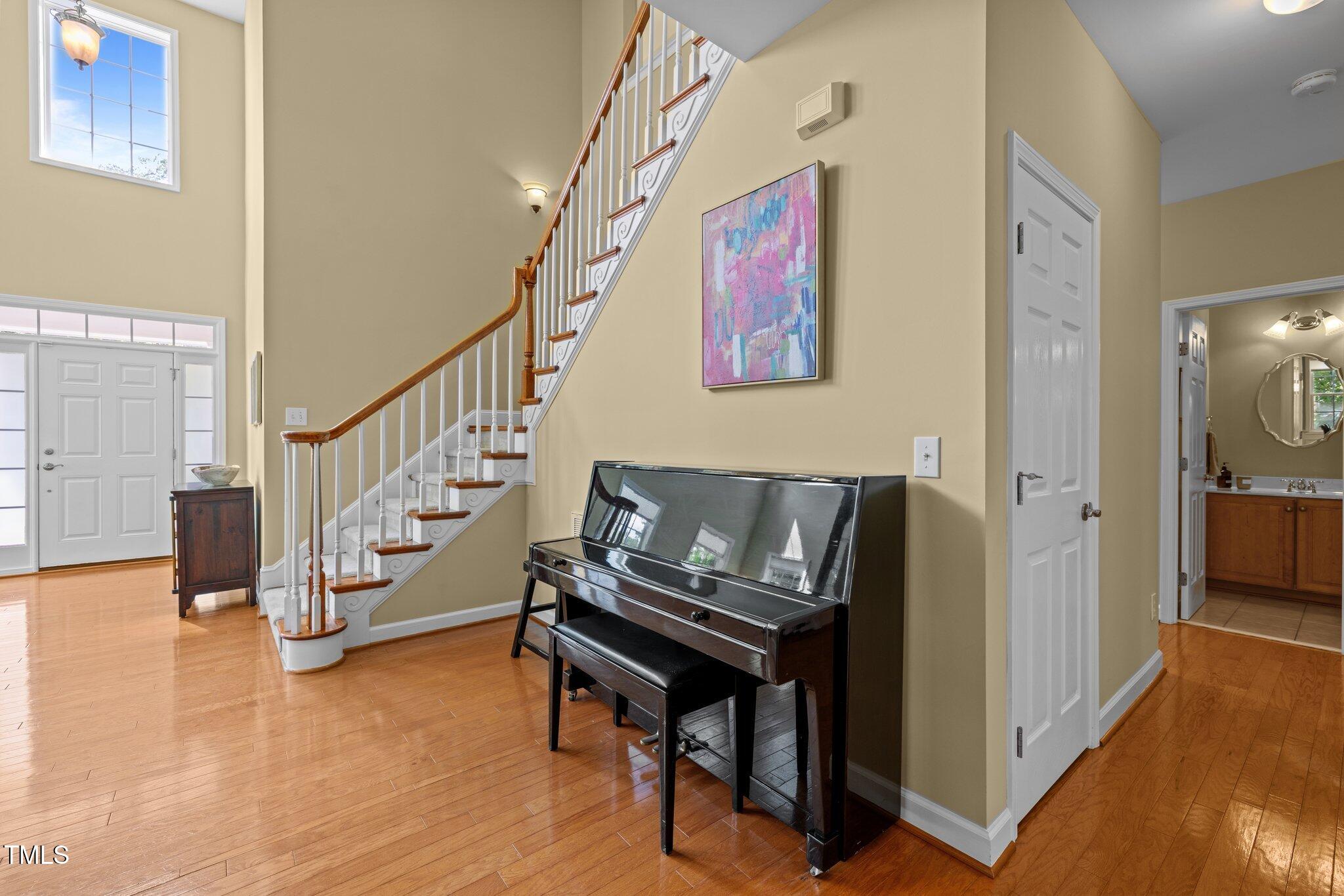 705 Harkness Circle Durham, NC 27705 - Photo 8 of 58 a living room with furniture and wooden floor