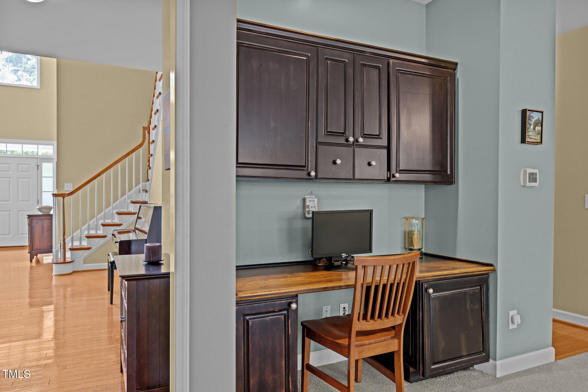 705 Harkness Circle Durham, NC 27705 - Photo 14 of 58 a view of entryway and hall with wooden floor