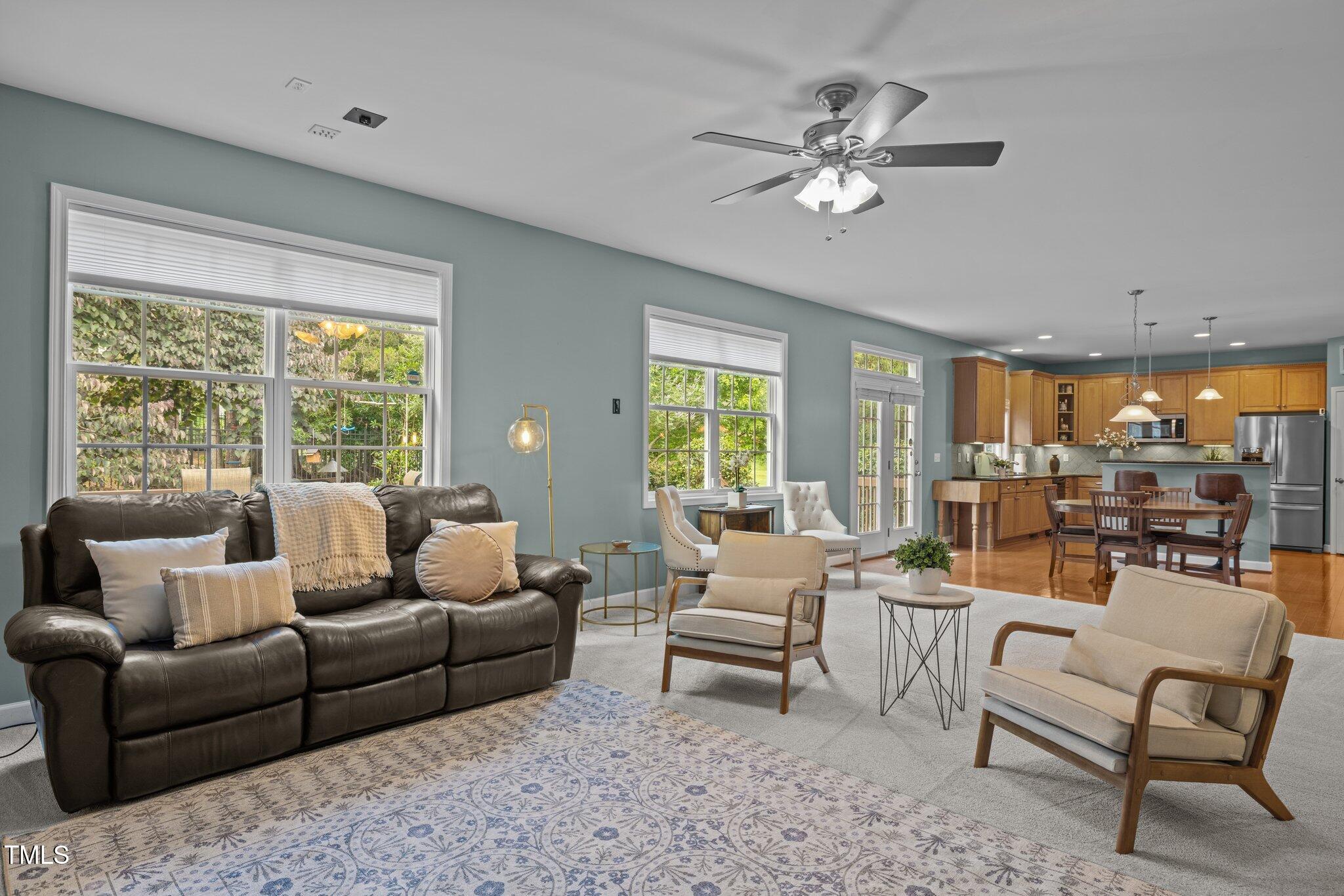 705 Harkness Circle Durham, NC 27705 - Photo 15 of 58 a living room with furniture and a large window