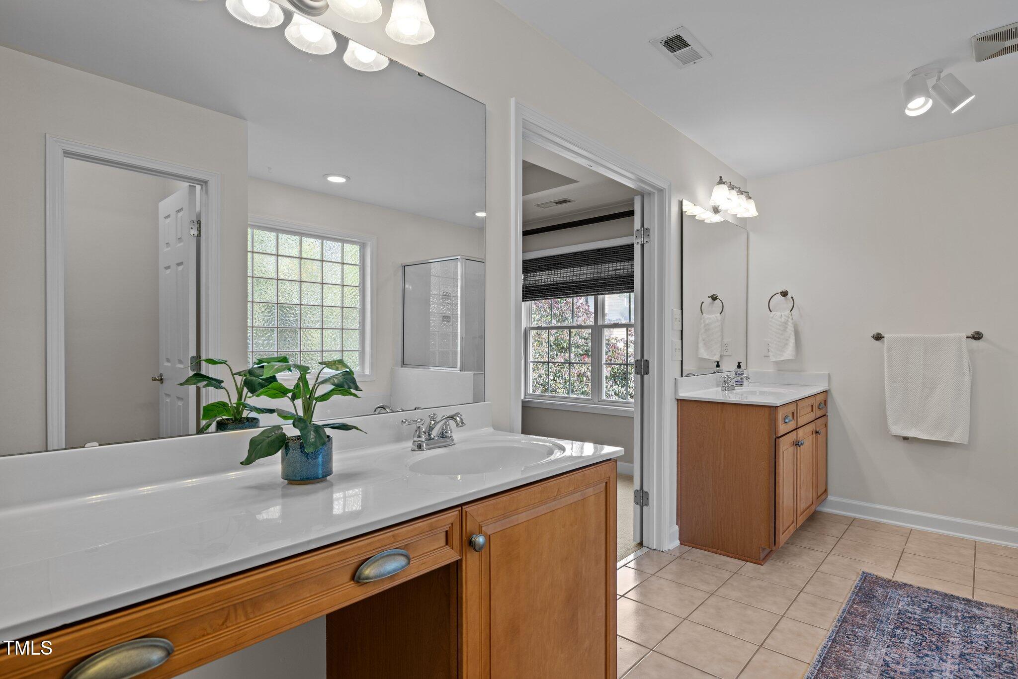 705 Harkness Circle Durham, NC 27705 - Photo 22 of 58 a kitchen with sink and stove