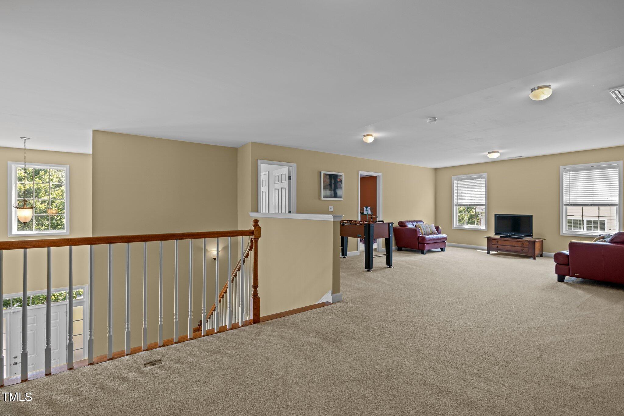 705 Harkness Circle Durham, NC 27705 - Photo 24 of 58 a view of a livingroom with furniture and windows