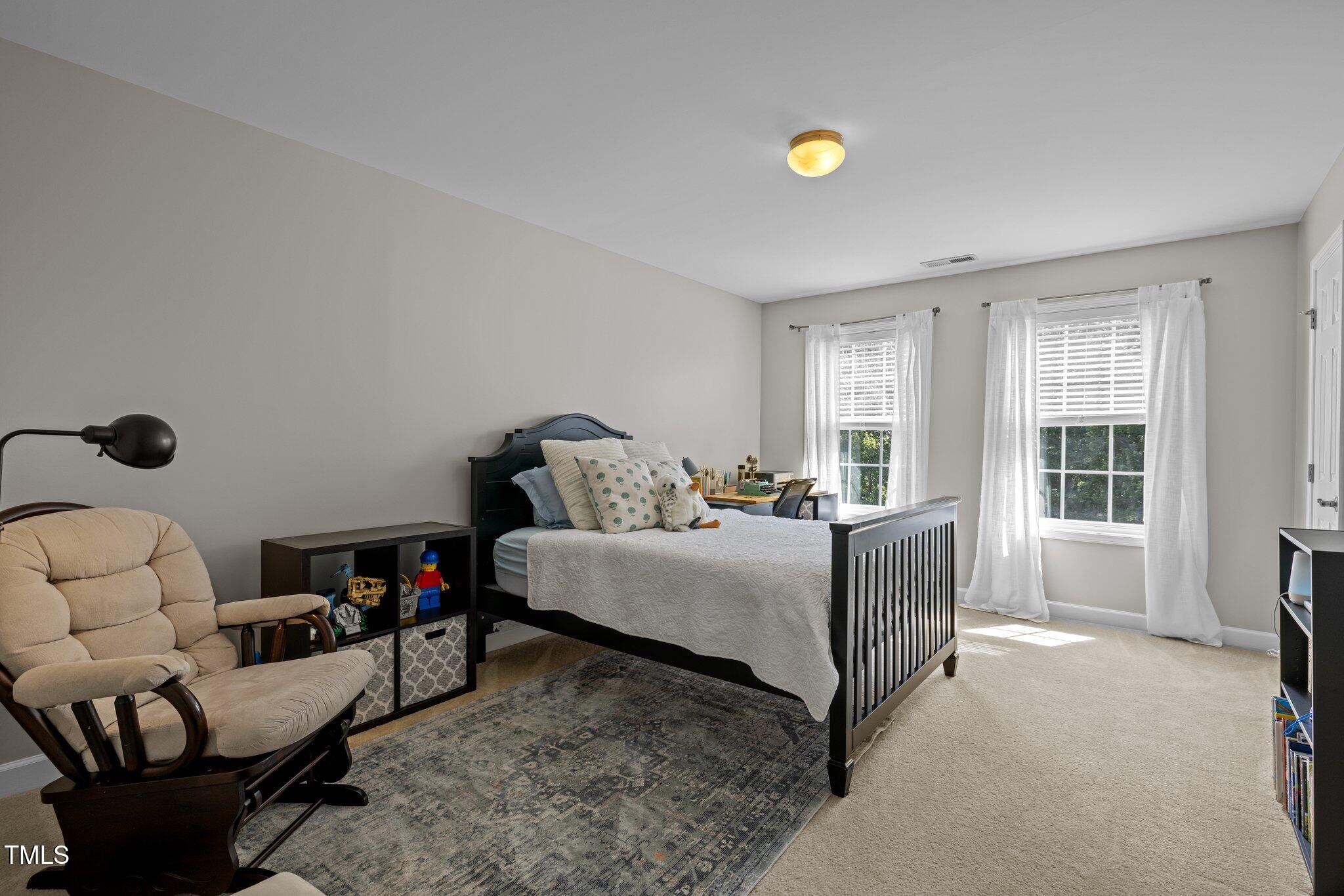 705 Harkness Circle Durham, NC 27705 - Photo 25 of 58 a living room with furniture and a window