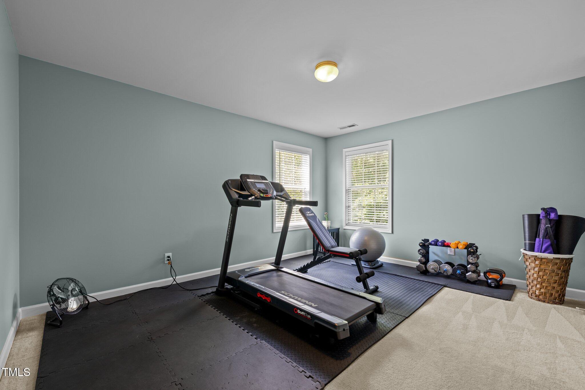 705 Harkness Circle Durham, NC 27705 - Photo 32 of 58 a view of a room with gym equipment