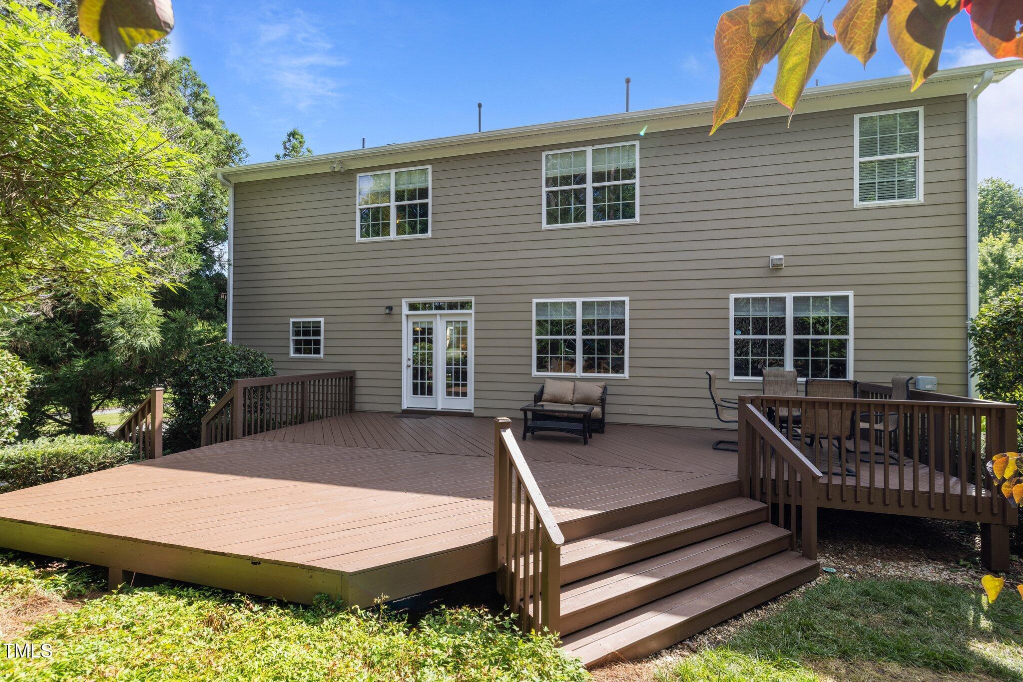 705 Harkness Circle Durham, NC 27705 - Photo 38 of 58 a view of a house with backyard and sitting area