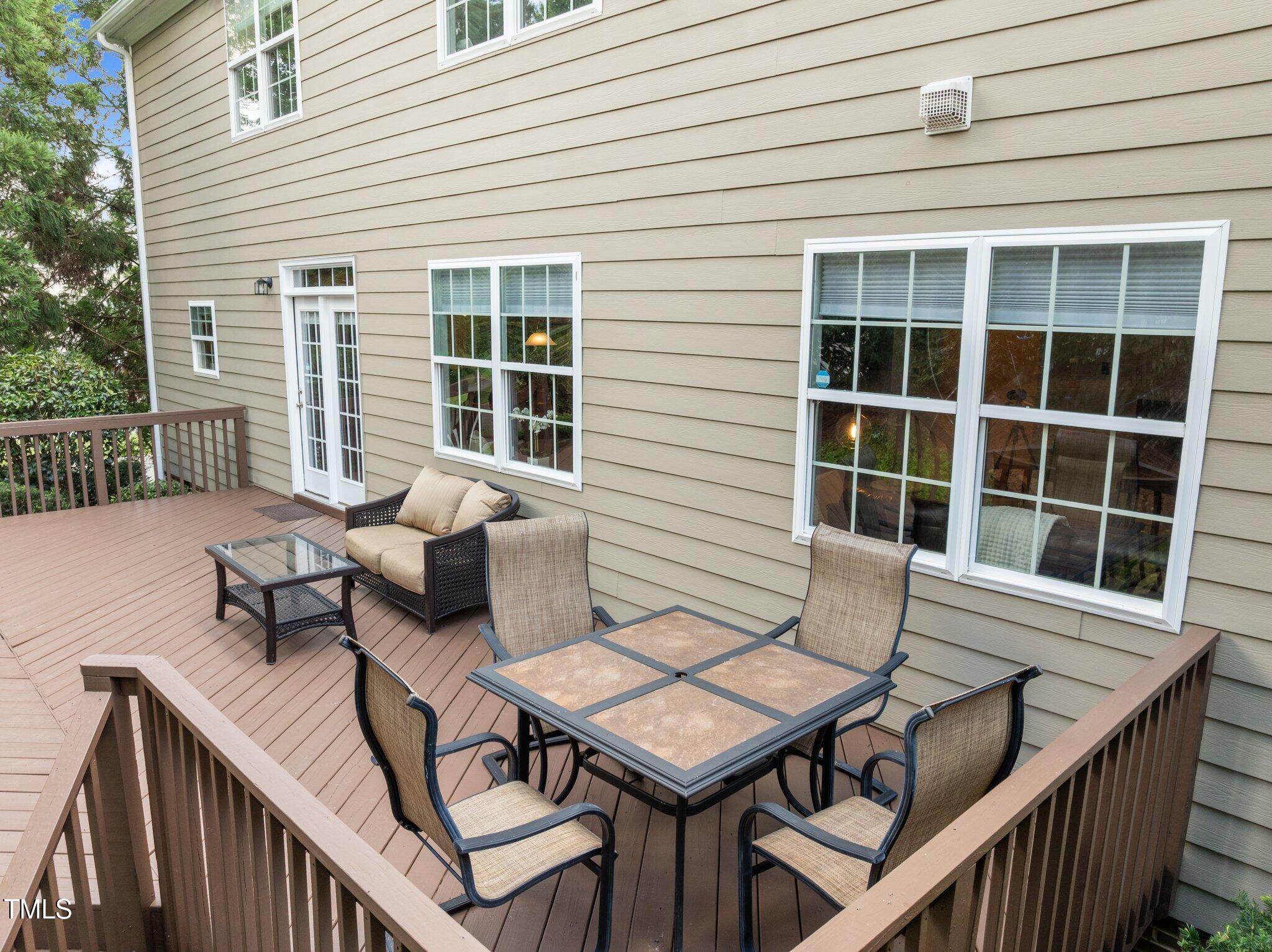 705 Harkness Circle Durham, NC 27705 - Photo 46 of 58 a view of a patio with couple of chairs