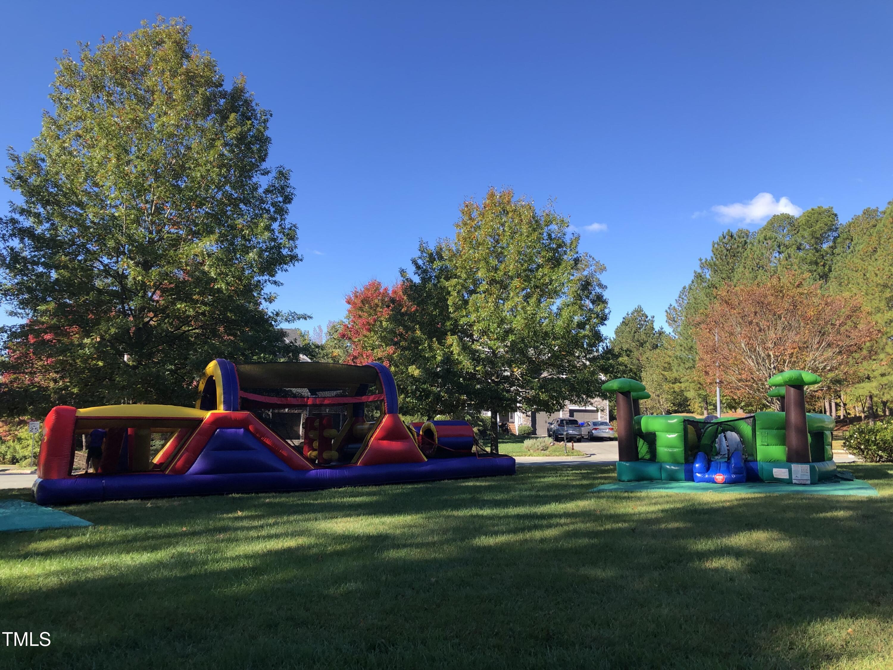 705 Harkness Circle Durham, NC 27705 - Photo 49 of 58 a childrens park with lots of swings and slides