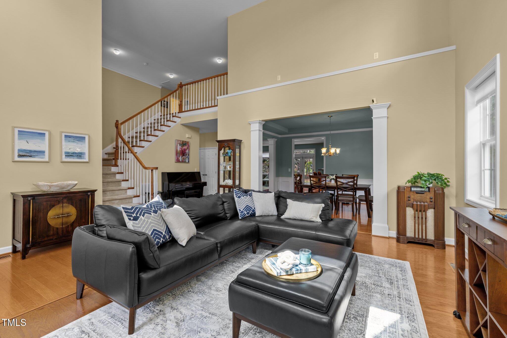 705 Harkness Circle Durham, NC 27705 - Photo 4 of 58 a living room with furniture and a fireplace