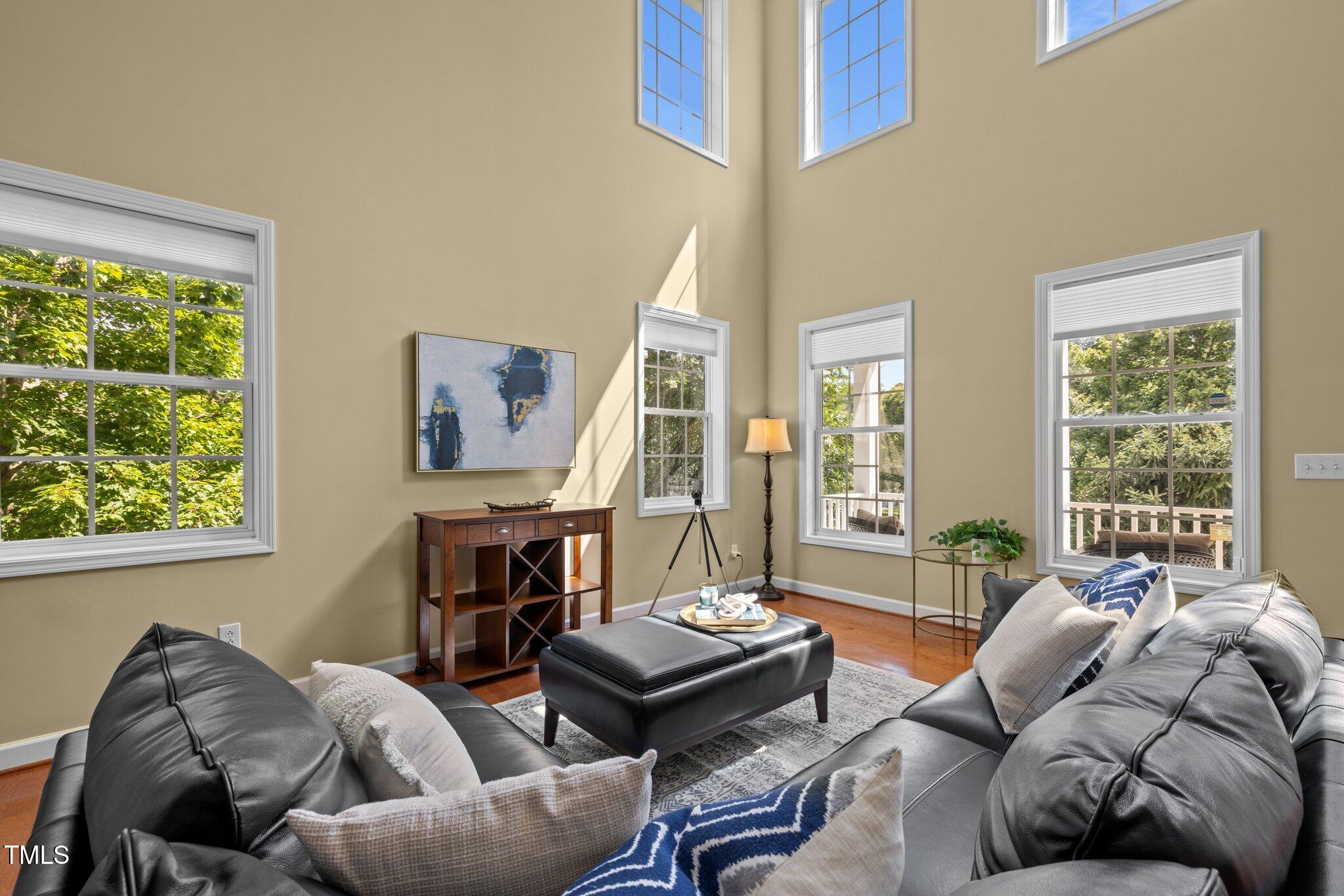 705 Harkness Circle Durham, NC 27705 - Photo 5 of 58 a living room with furniture and a large window