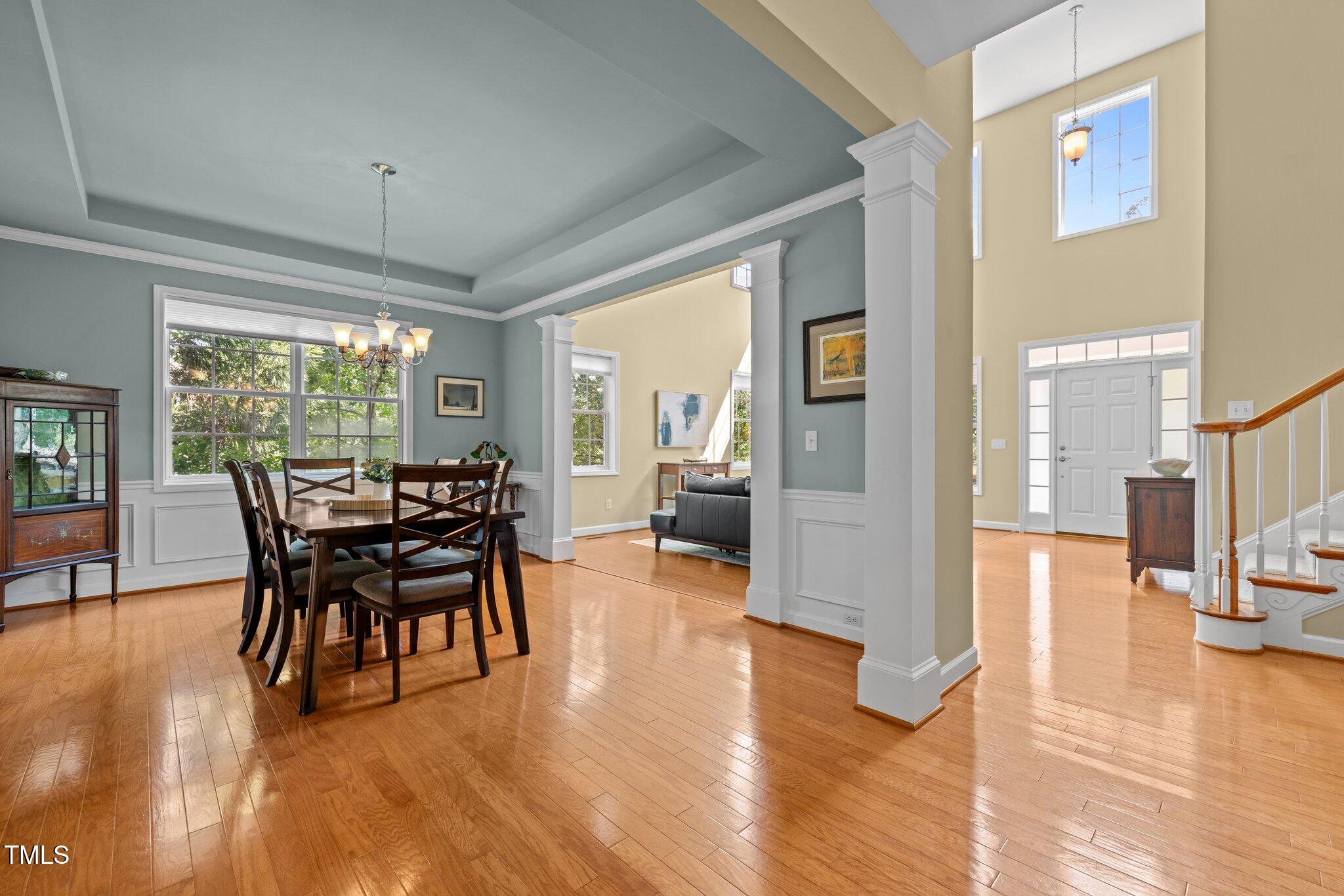 705 Harkness Circle Durham, NC 27705 - Photo 7 of 58 a view of a dining room with furniture window and wooden floor