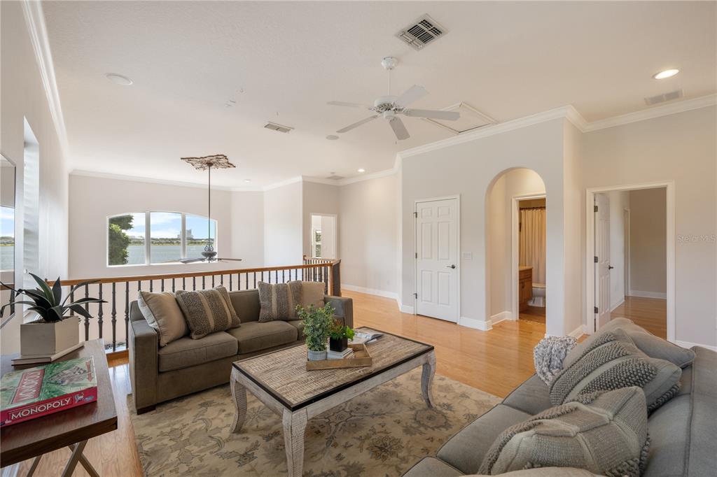8119 Vía Rosa Orlando, FL 32836 - Photo 31 of 62 a living room with furniture and a large window