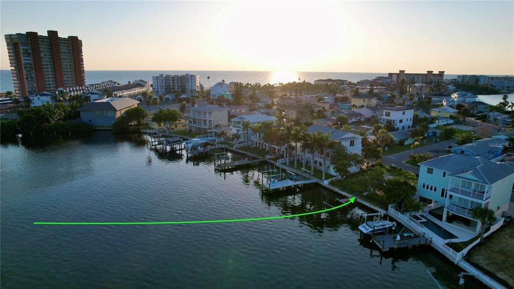 415 180th Avenue East Redington Shores, FL 33708 - Photo 11 of 29 a view of a lake with a terrace