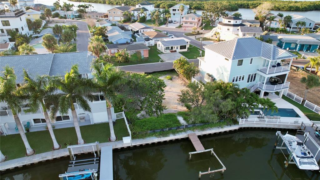 415 180th Avenue East Redington Shores, FL 33708 - Photo 27 of 29 an aerial view of house with yard swimming pool and outdoor seating