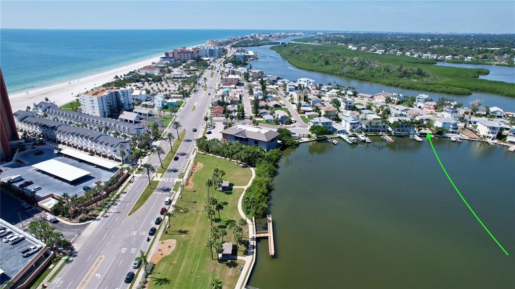 415 180th Avenue East Redington Shores, FL 33708 - Photo 8 of 29 an aerial view of a house with a lake