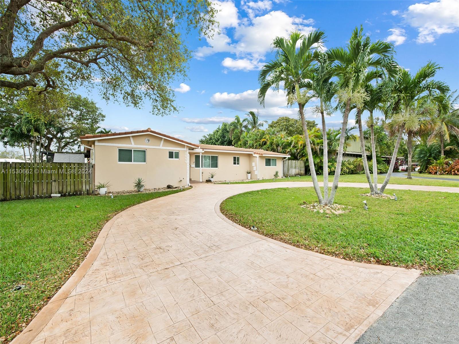 3444 Pierce Street Hollywood, FL 33021 - Photo 3 of 27 a view of outdoor space yard and tree