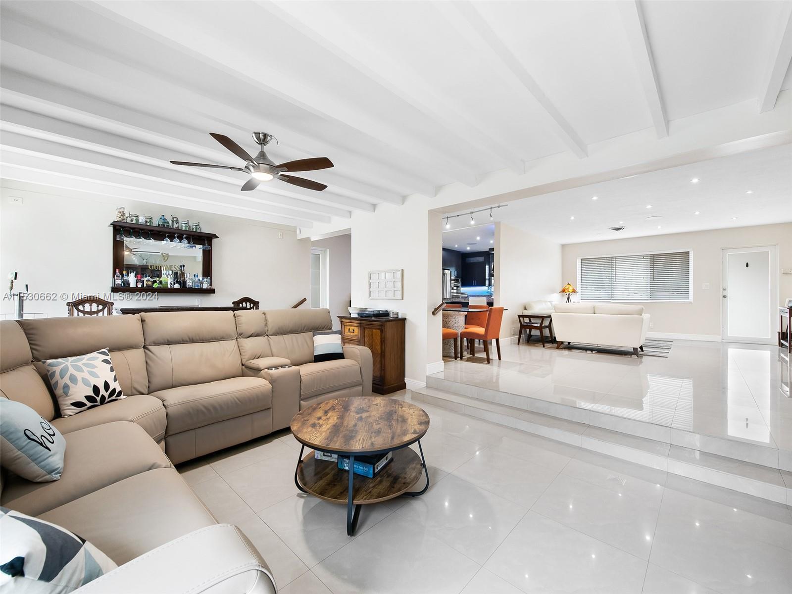 3444 Pierce Street Hollywood, FL 33021 - Photo 7 of 27 a living room with furniture and view of kitchen