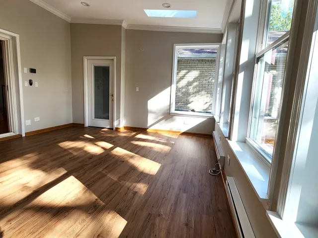 a view of gallery with wooden floor